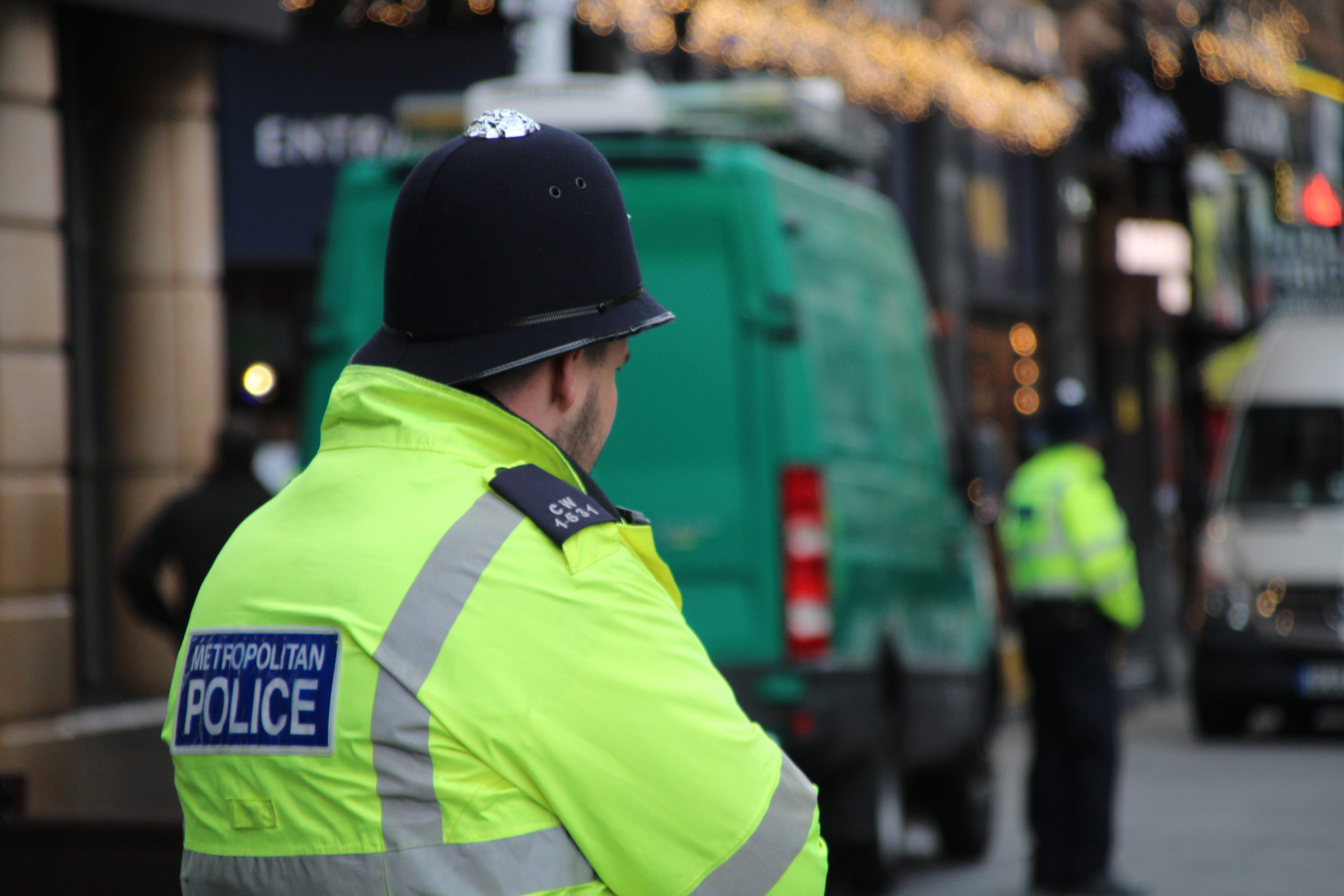 Police stood beside a facial recognition van.