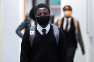 School pupil wearing face mask