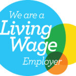 Text logo that says "We are a Living Wage Employer"